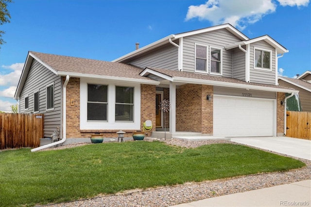 11131 Seton Pl, Westminster, CO 80031 - view of front of property with brick siding, concrete driveway, a garage, and a shingled roof