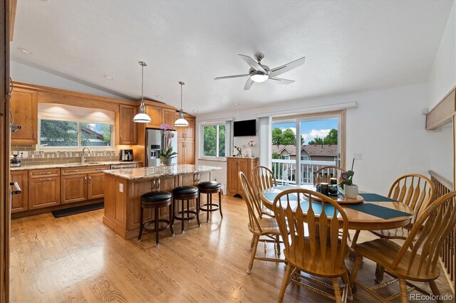 11131 Seton Pl, Westminster, CO 80031 - dining room featuring light wood-type flooring, a ceiling fan, lofted ceiling, and recessed lighting