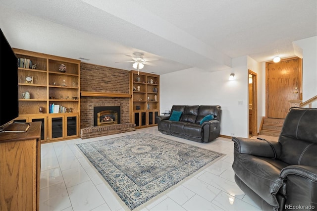 11131 Seton Pl, Westminster, CO 80031 - living area featuring light marble finish floors, ceiling fan, a fireplace, baseboards, and stairway