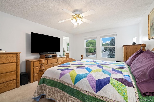 11131 Seton Pl, Westminster, CO 80031 - bedroom featuring light colored carpet, a textured ceiling, and ceiling fan