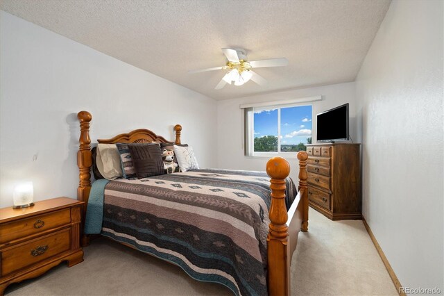11131 Seton Pl, Westminster, CO 80031 - bedroom featuring light carpet, a ceiling fan, a textured ceiling, and baseboards