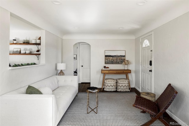 living room with dark wood-type flooring