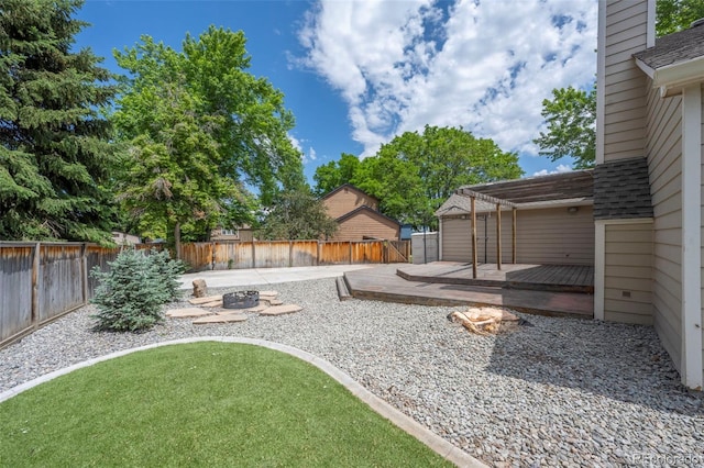 12665 Grove Ct, Broomfield, CO 80020 - fenced backyard featuring a deck, a pergola, and a patio area