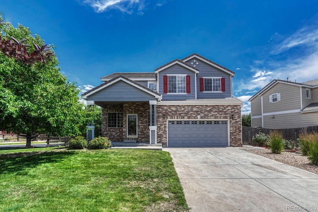 2452 S Andes Cir, Aurora, CO 80013 - view of front of home featuring driveway, a garage, and brick siding