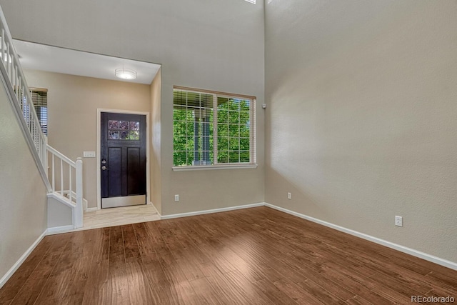 2452 S Andes Cir, Aurora, CO 80013 - entrance foyer featuring wood finished floors and stairway