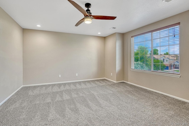 2452 S Andes Cir, Aurora, CO 80013 - empty room with a ceiling fan, carpet floors, and recessed lighting