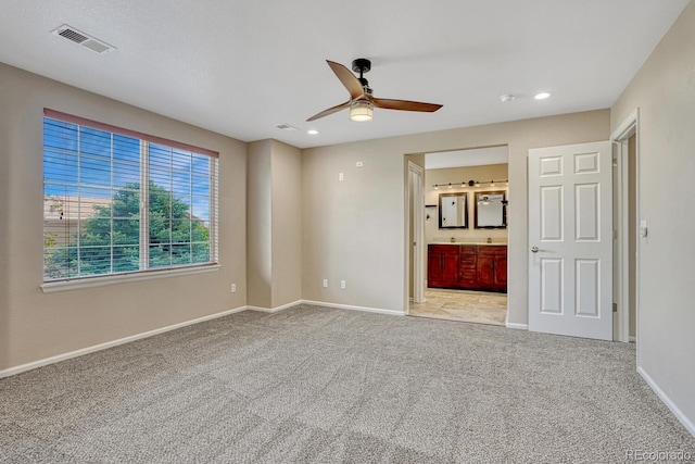 2452 S Andes Cir, Aurora, CO 80013 - unfurnished bedroom featuring carpet flooring, recessed lighting, ensuite bathroom, and ceiling fan