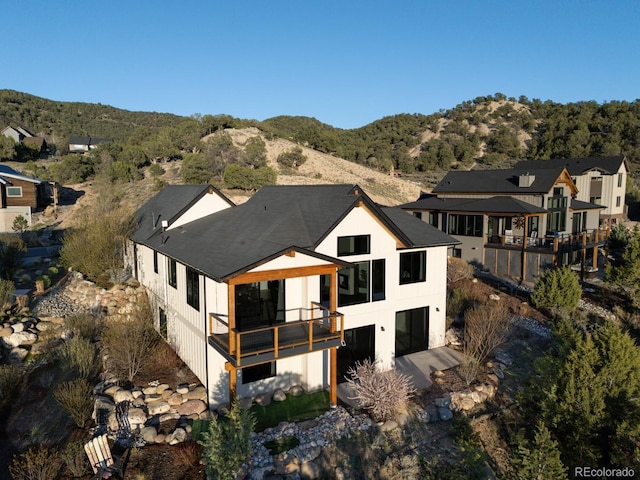 103 Paintbrush Way, Glenwood Springs, CO 81601 - rear view of house featuring a mountain view and roof with shingles
