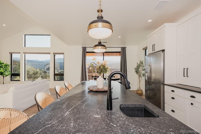103 Paintbrush Way, Glenwood Springs, CO 81601 - dining area featuring recessed lighting, a mountain view, and vaulted ceiling