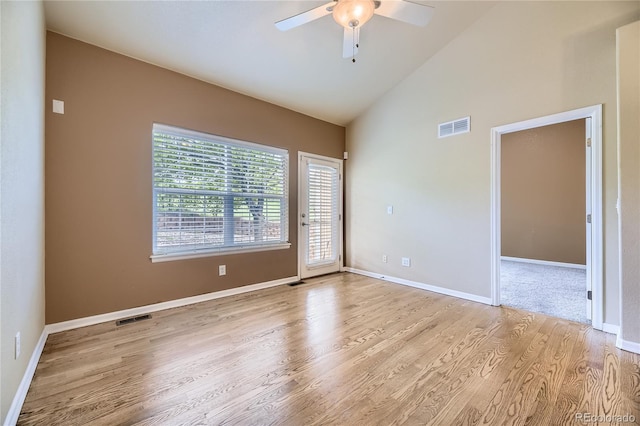 6727 W Yale Ave, Lakewood, CO 80227 - unfurnished room with light wood-style flooring, a ceiling fan, baseboards, and high vaulted ceiling