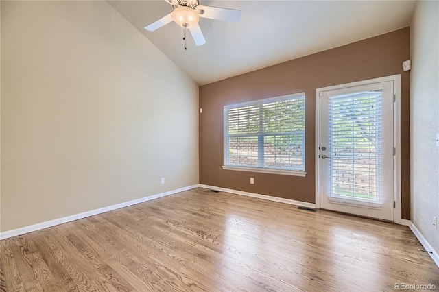 6727 W Yale Ave, Lakewood, CO 80227 - unfurnished room featuring light wood-type flooring, vaulted ceiling, a ceiling fan, and baseboards