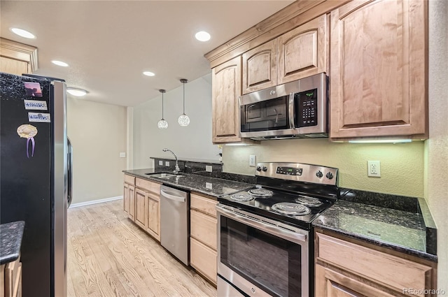 6727 W Yale Ave, Lakewood, CO 80227 - kitchen with stainless steel appliances, a sink, light brown cabinets, light wood-style flooring, and recessed lighting