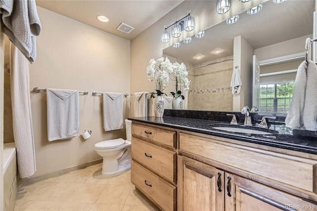 6727 W Yale Ave, Lakewood, CO 80227 - full bathroom featuring toilet, vanity, tile patterned floors, baseboards, and shower / tub combo with curtain
