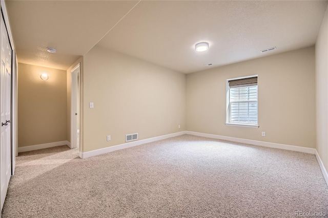 6727 W Yale Ave, Lakewood, CO 80227 - spare room with light colored carpet and baseboards