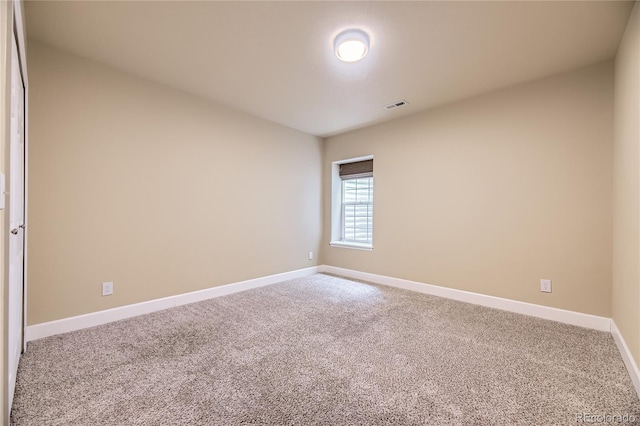 6727 W Yale Ave, Lakewood, CO 80227 - carpeted spare room with baseboards