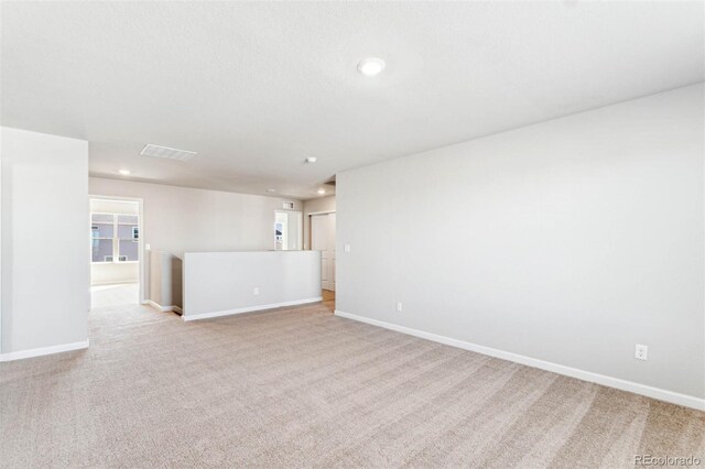 974 Cascade Falls St, Severance, CO 80550 - empty room with light colored carpet and recessed lighting