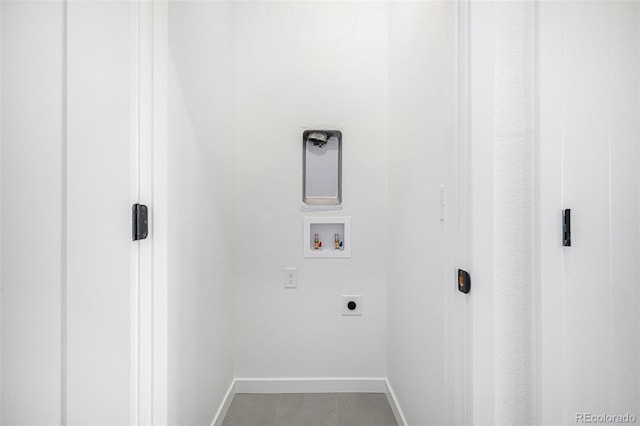 clothes washing area featuring laundry area, electric dryer hookup, washer hookup, and baseboards