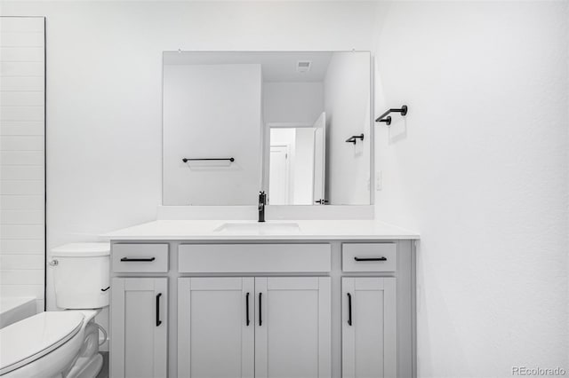 bathroom with toilet, visible vents, a washtub, vanity, and a shower
