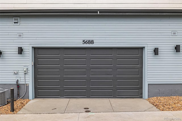 garage featuring driveway
