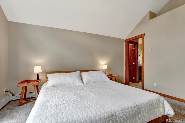 carpeted bedroom with baseboards and vaulted ceiling