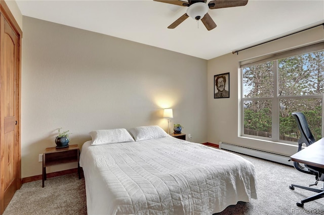 bedroom featuring light carpet, ceiling fan, baseboards, and a baseboard radiator