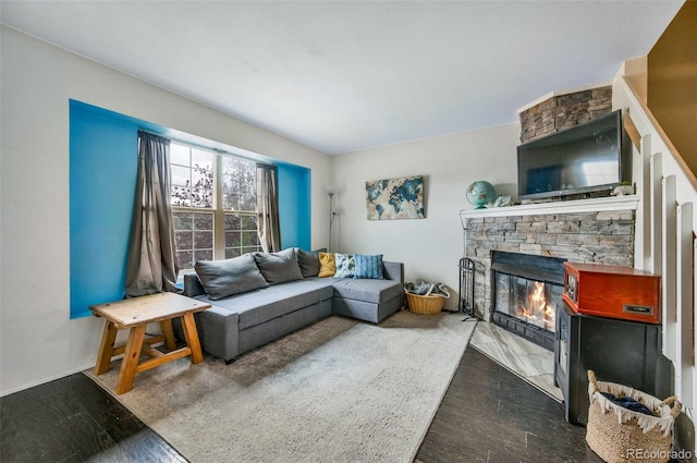 3831 Smoke Tree Dr, Colorado Springs, CO 80920 - living area with a stone fireplace and wood finished floors