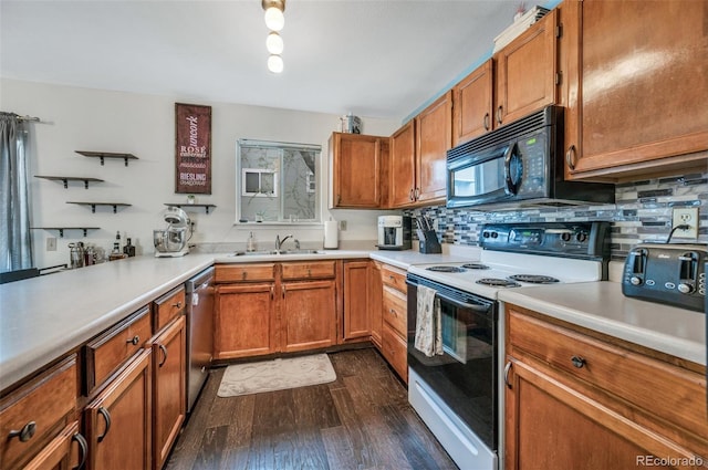 3831 Smoke Tree Dr, Colorado Springs, CO 80920 - kitchen featuring dark wood-style flooring, black microwave, white range with electric cooktop, stainless steel dishwasher, and a sink