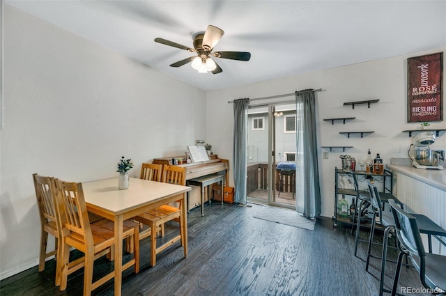 3831 Smoke Tree Dr, Colorado Springs, CO 80920 - dining room featuring baseboards, a ceiling fan, and wood finished floors