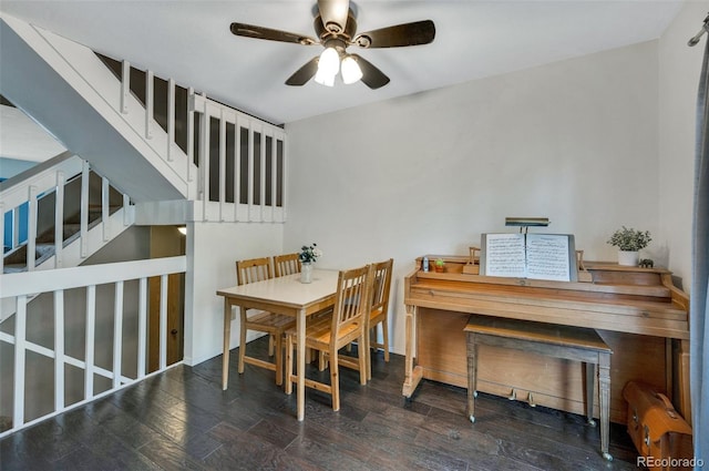 3831 Smoke Tree Dr, Colorado Springs, CO 80920 - dining space with a ceiling fan, stairs, and wood finished floors