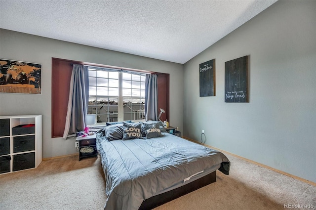 3831 Smoke Tree Dr, Colorado Springs, CO 80920 - bedroom with a textured ceiling, baseboards, and carpet