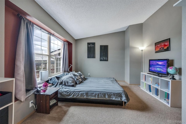 3831 Smoke Tree Dr, Colorado Springs, CO 80920 - bedroom with baseboards, carpet flooring, a textured ceiling, and lofted ceiling