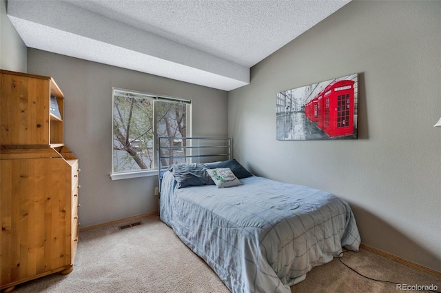 3831 Smoke Tree Dr, Colorado Springs, CO 80920 - bedroom with carpet floors, a textured ceiling, baseboards, and visible vents