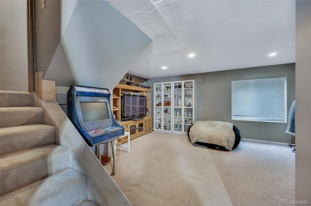 3831 Smoke Tree Dr, Colorado Springs, CO 80920 - sitting room featuring carpet floors, baseboards, recessed lighting, and a textured ceiling