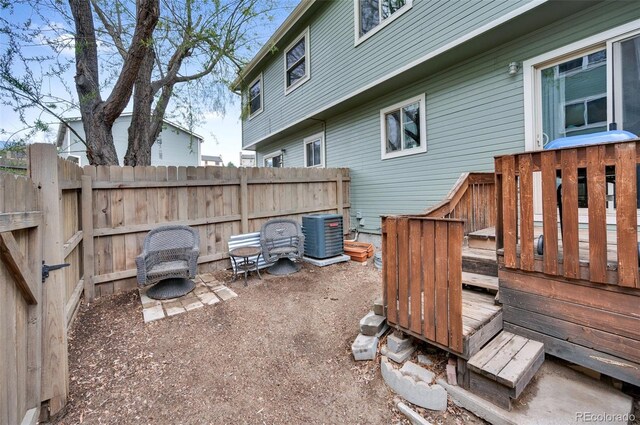 3831 Smoke Tree Dr, Colorado Springs, CO 80920 - view of yard with central AC and fence
