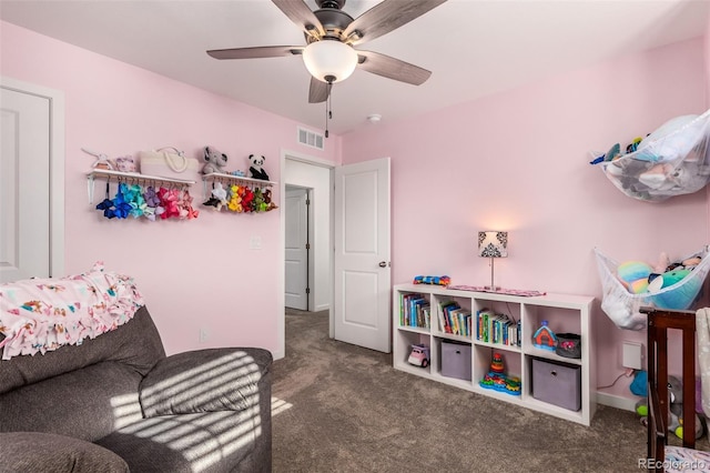 bedroom with visible vents, carpet floors, and a ceiling fan