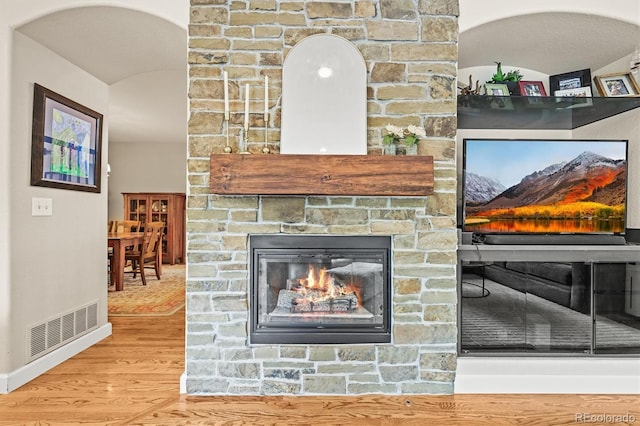 6105 W Long Dr, Littleton, CO 80123 - detailed view of wood finished floors and a fireplace