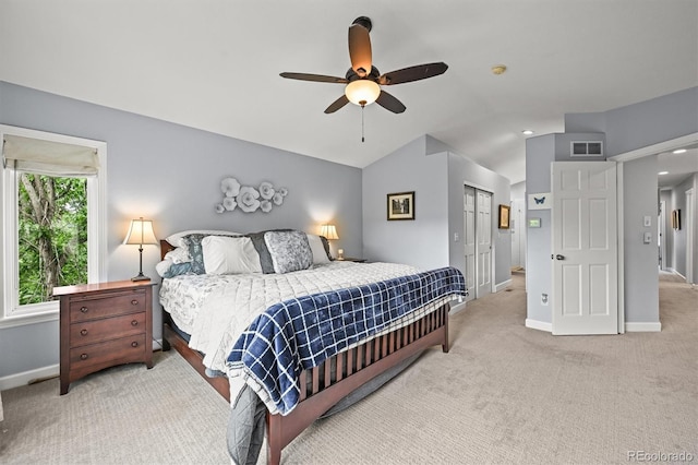6105 W Long Dr, Littleton, CO 80123 - bedroom with vaulted ceiling, carpet, a closet, and a ceiling fan