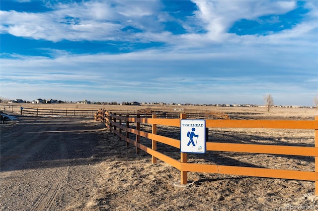 exterior space featuring a rural view and fence