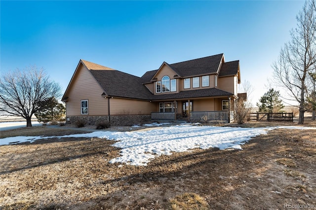 view of front of property featuring covered porch