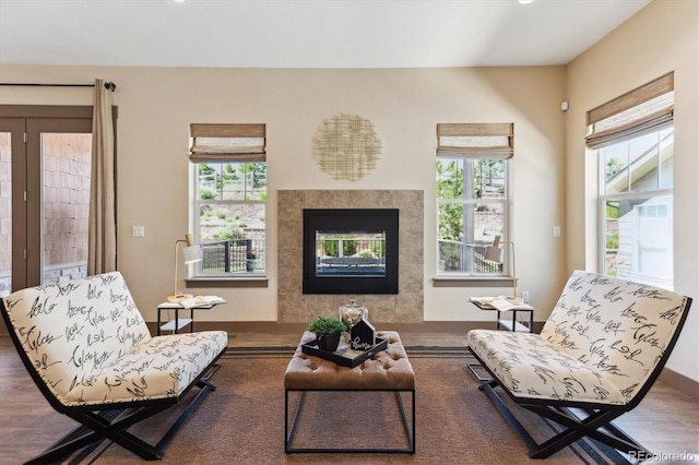 24322 E Mineral Dr, Aurora, CO 80016 - living room featuring a fireplace and wood finished floors