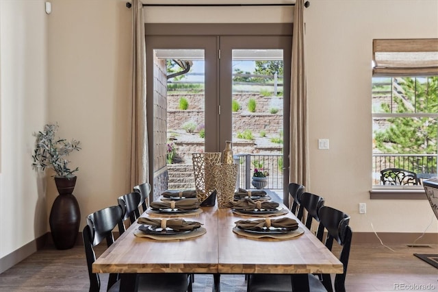 24322 E Mineral Dr, Aurora, CO 80016 - dining room featuring wood finished floors and healthy amount of natural light