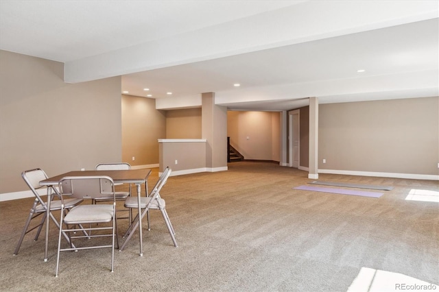 24322 E Mineral Dr, Aurora, CO 80016 - dining area with carpet floors, stairs, and recessed lighting