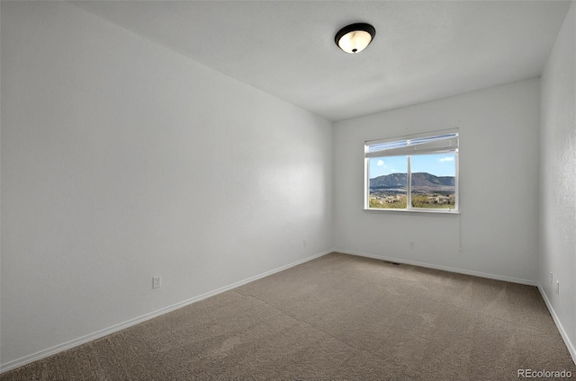 16043 Bridle Ridge Dr, Monument, CO 80132 - carpeted spare room with baseboards