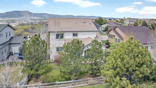 16043 Bridle Ridge Dr, Monument, CO 80132 - aerial view of property's location featuring nearby suburban area and a mountainous background