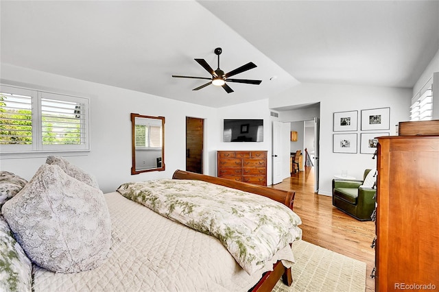 8427 S Parfet Ct, Littleton, CO 80127 - bedroom with lofted ceiling, wood finished floors, and a ceiling fan