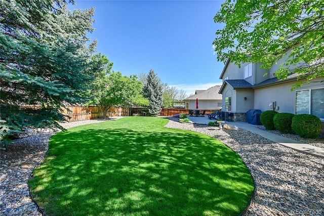 8427 S Parfet Ct, Littleton, CO 80127 - view of yard featuring a patio