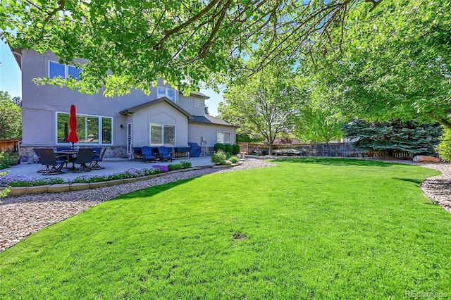 8427 S Parfet Ct, Littleton, CO 80127 - view of yard featuring a patio