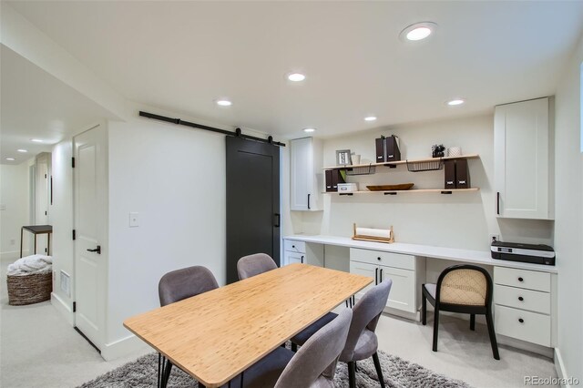 7036 Robb St, Arvada, CO 80004 - dining room with a barn door, light carpet, recessed lighting, and an office area