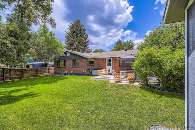 7036 Robb St, Arvada, CO 80004 - view of yard featuring a patio area