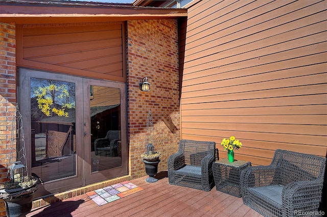 wooden deck featuring french doors